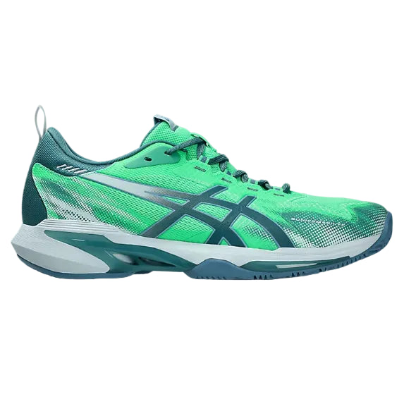 Green running shoe with white sole on a white background