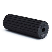 Black foam roller with 'Black Roll' branding on a white background