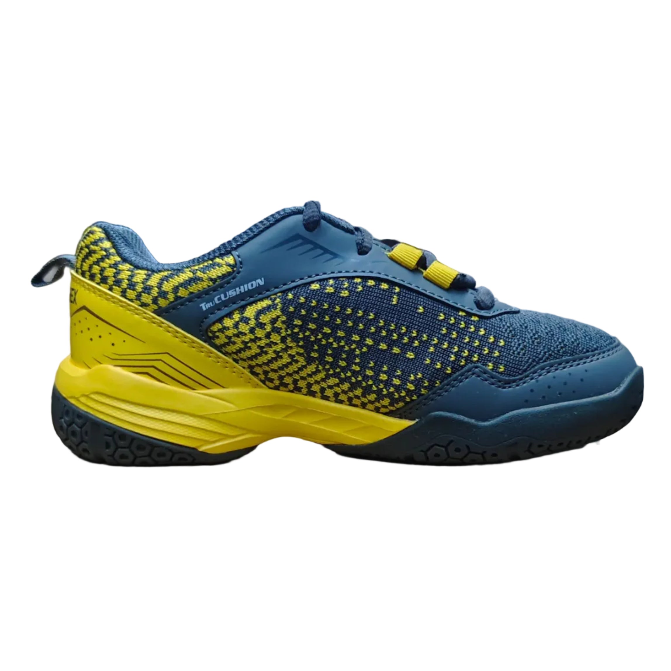 Blue and yellow sneaker on a cardboard box in a warehouse setting