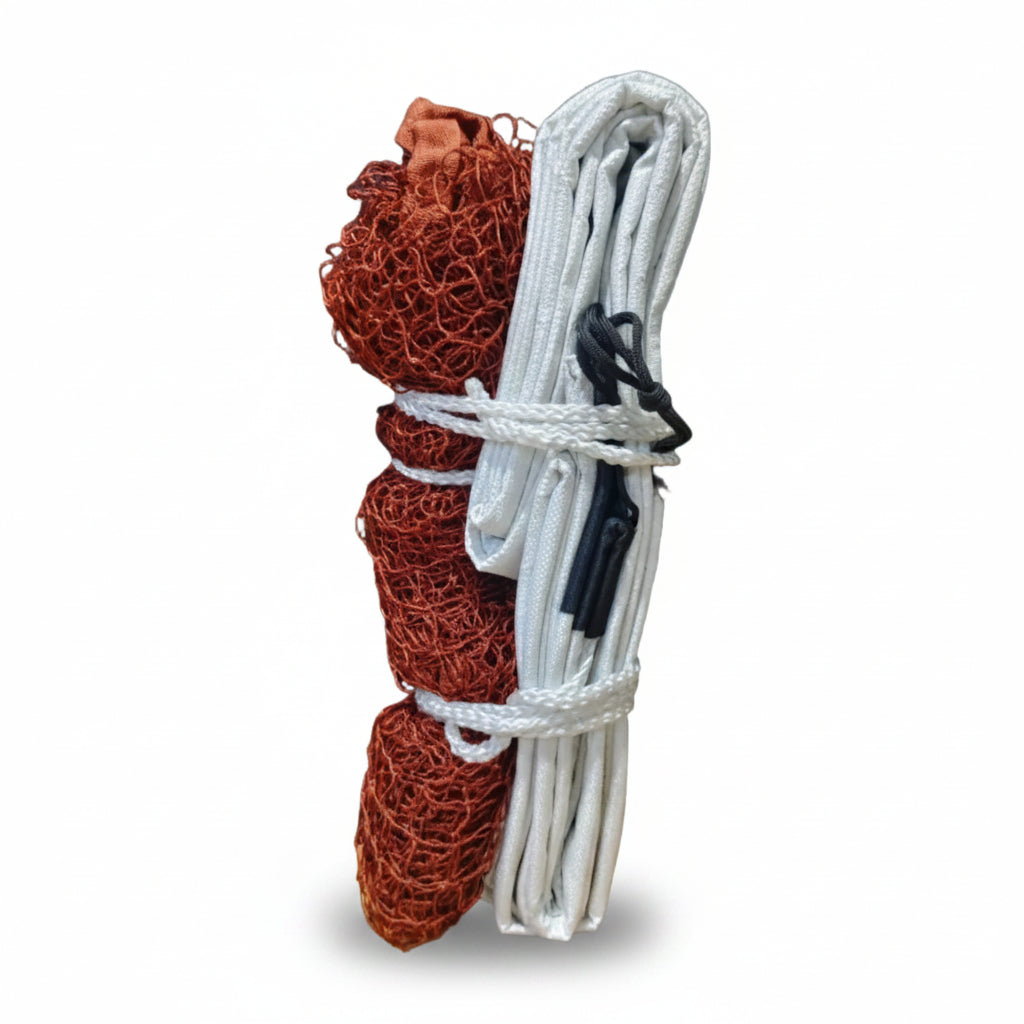 A bundled set of Badminton nets and cords, featuring reddish-brown mesh wrapped with white rope and white rope wrapped with black clips, standing on a wooden surface against a dark gray background.