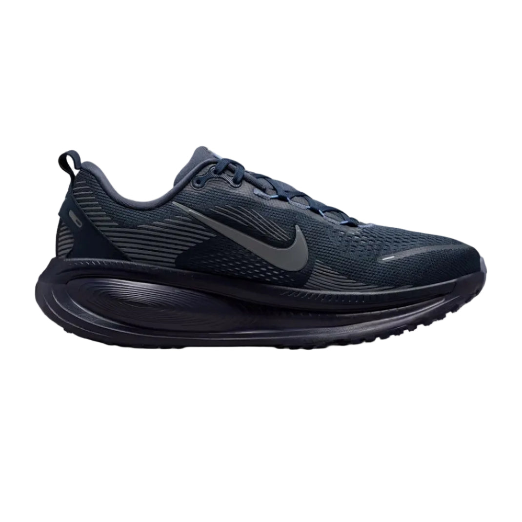 A dark navy blue Nike running shoe shown from the side profile against a clean white background.