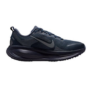 A dark navy blue Nike running shoe shown from the side profile against a clean white background.