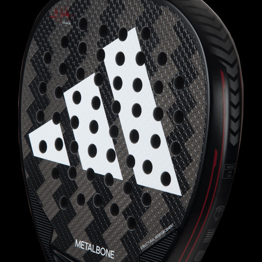 Adidas Metalbone 3.3 padel racquet with an ergonomic design for improved grip and comfort during play
